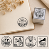 Dog library stamp pressed in black ink inside an open book