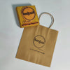 Custom rubber stamp with a personalised logo on a wooden mount